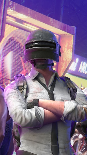 Player from PUBG wearing a helmet and white shirt