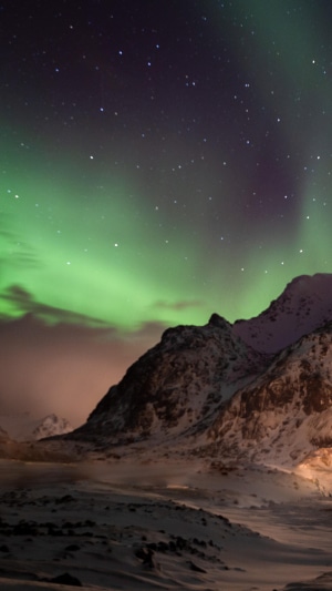 Northern Lights over Snowy Mountains 4K