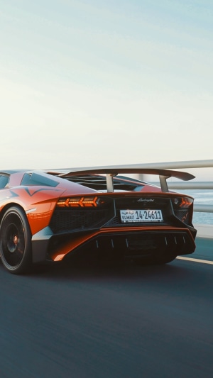 Orange Lamborghini Aventador with spoiler