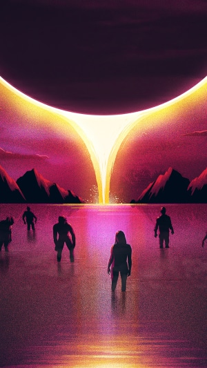People standing in water during a solar eclipse
