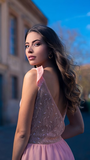 Model in pink dress outdoors