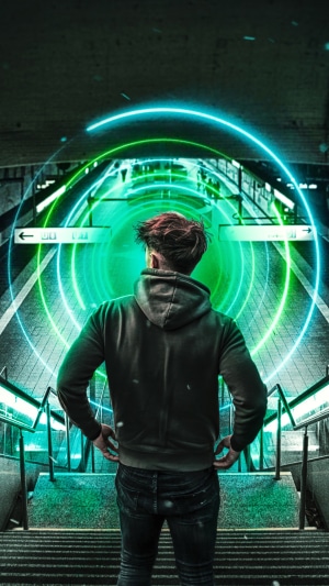 Man in hoodie in subway with neon circles 4K