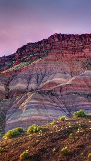 Layered rock formations at sunrise