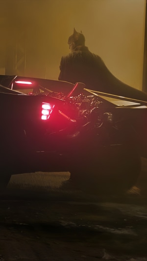 Batman from The Batman in his Batmobile