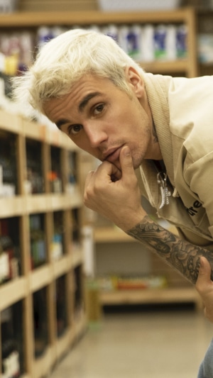 Justin Bieber in a store aisle