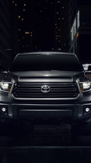 Toyota Tundra truck at night in city