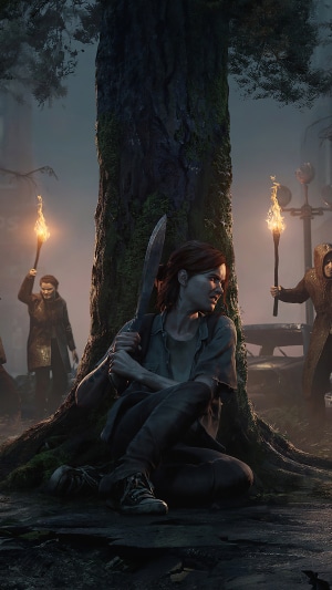 Ellie from The Last of Us Part II with torches