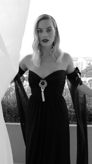 Margot Robbie in black dress