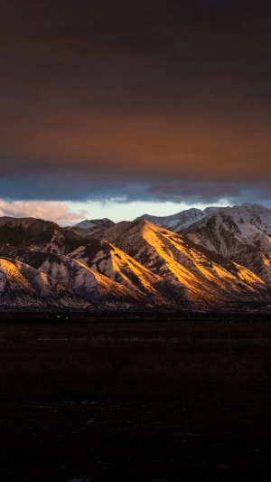 Mountains at sunset with snow