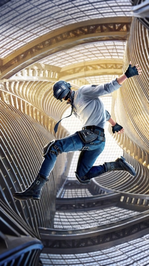Player from PUBG jumping in a futuristic building