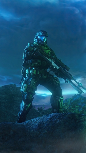 Master Chief from Halo standing on a rocky outcrop