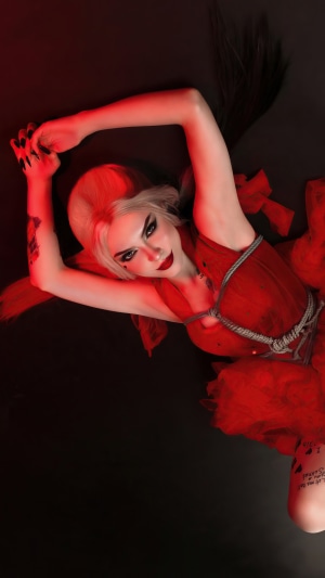 Harley Quinn cosplay in red outfit