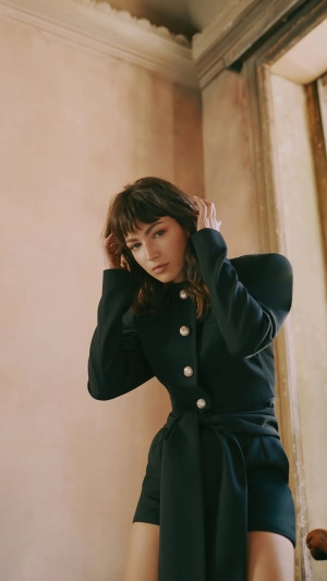Ursula Corbero in a black outfit