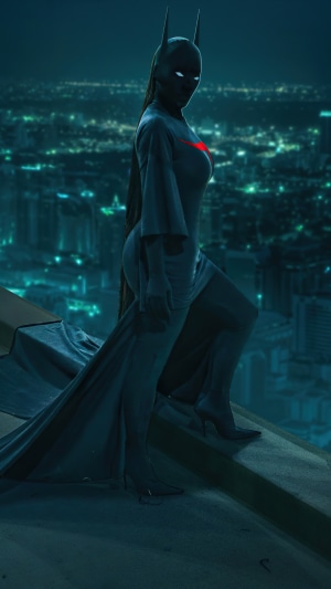 Batgirl artwork with red bat symbol