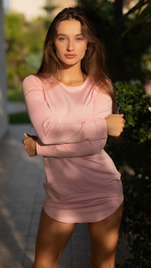 Gloria Sol in pink dress