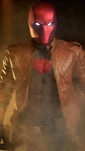 Red Hood in a brown leather jacket