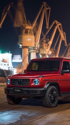 Red Mercedes G-Class at a Port at Night