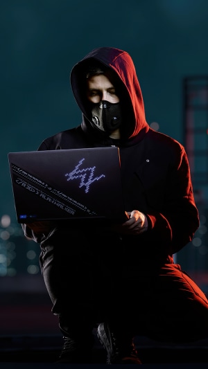 Alan Walker with Republic of Gamers laptop