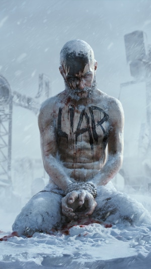 Man with LIAR written on chest in snow