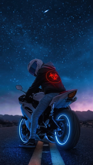 Biker with biohazard symbol on jacket at night