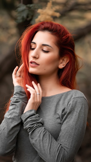 Redhead model with red hair and grey shirt