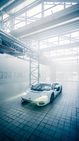 White Lamborghini Countach LPI 800-4 in a warehouse