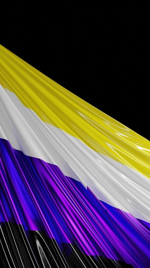 Nonbinary pride flag waving in the dark