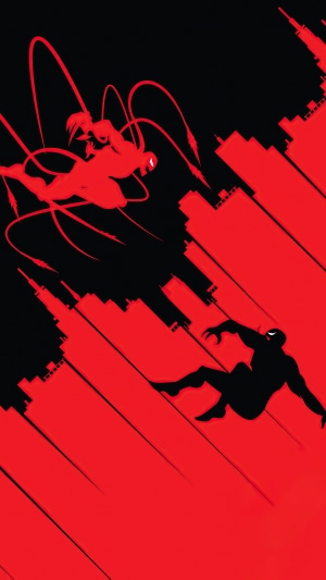 Carnage and Venom fighting in a city