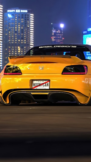 Yellow Honda S2000 with Hoonigan license plate