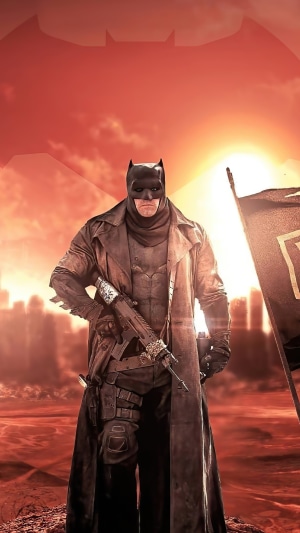 Batman with a rifle in a post-apocalyptic setting