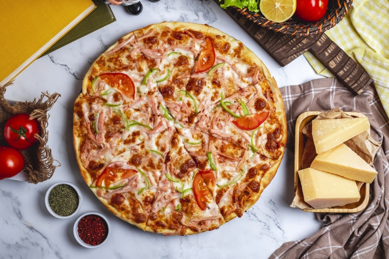 Pizza with Tomatoes, Cheese, and Spices