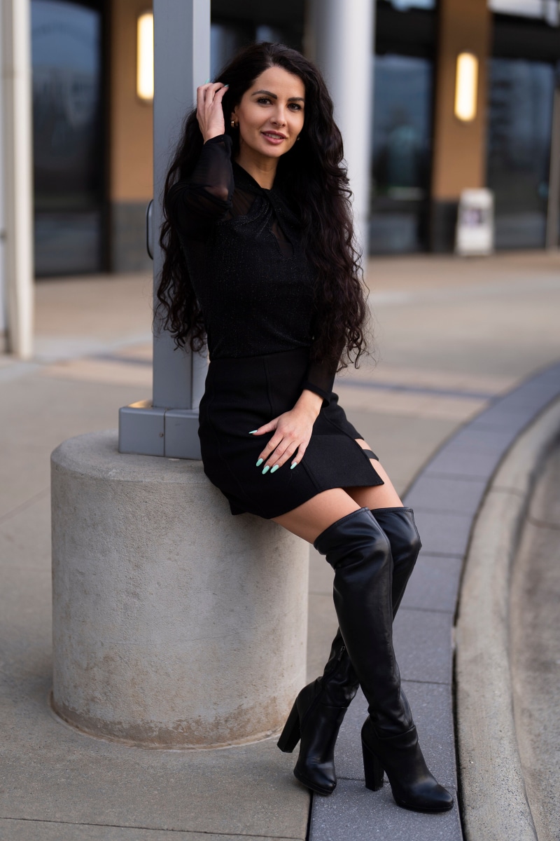 Victoria Bell wearing a black skirt and blouse