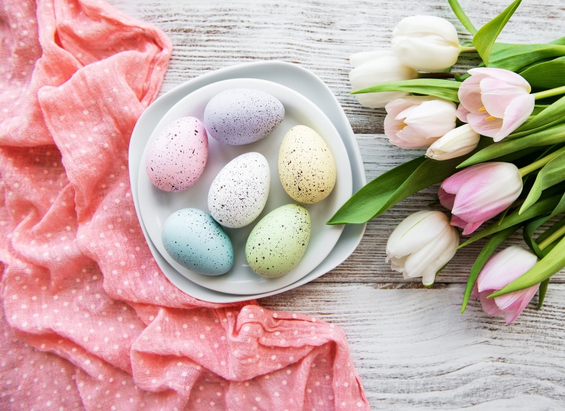 Easter Eggs and Tulips on a Table