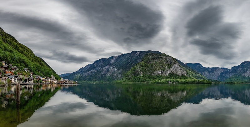 Hallstatt Village and Mountains Reflected in Lake, Austria