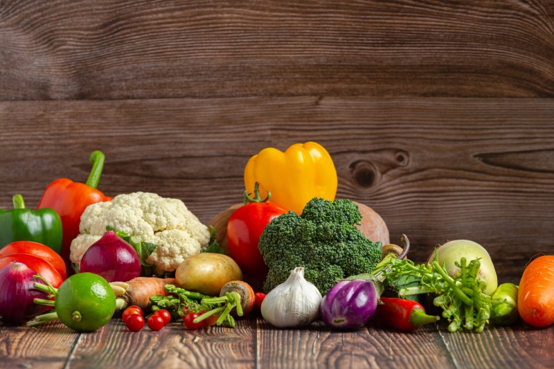 Assortment of Fresh Vegetables on Wooden Surface