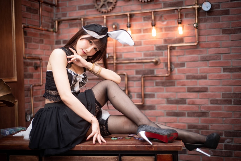 Asian Table Sitting Legs Stilettos Stockings Skirt Singlet