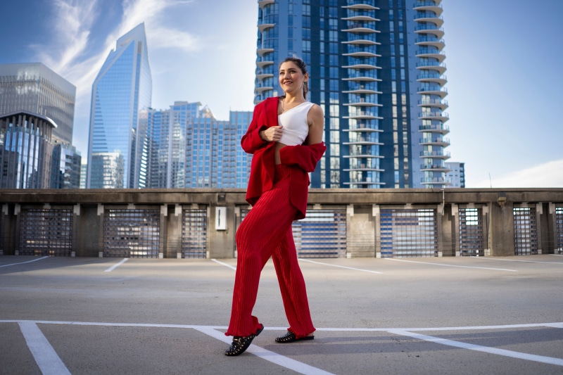 Model Tania d'Anconia in red suit