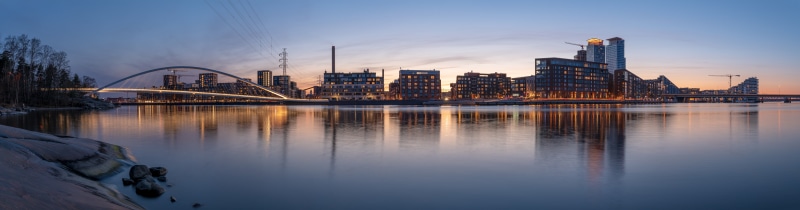 Panorama of Helsinki waterfront with bridge and buildings
