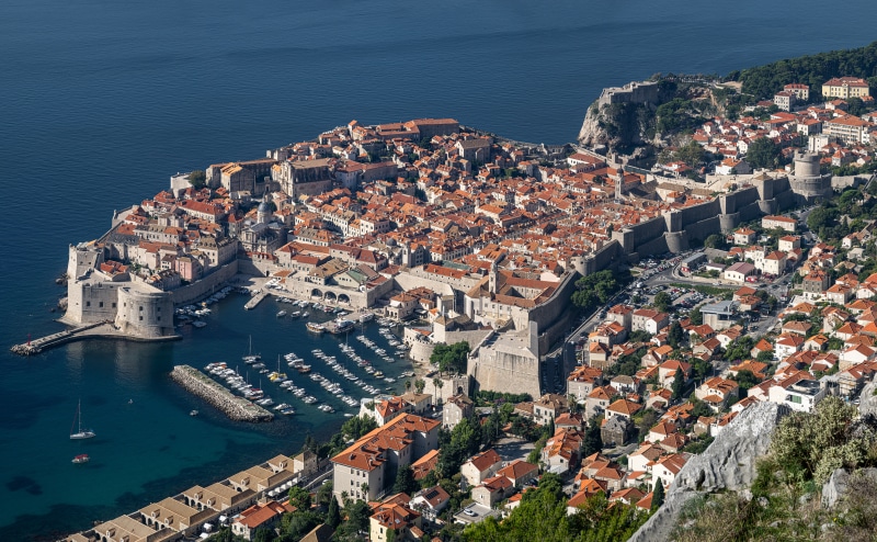 Dubrovnik, Croatia from above with harbor and city walls