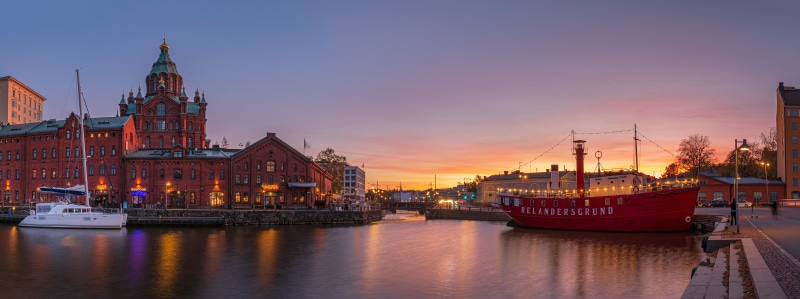 Helsinki Waterfront at Dusk with Red Ship and Sailboat