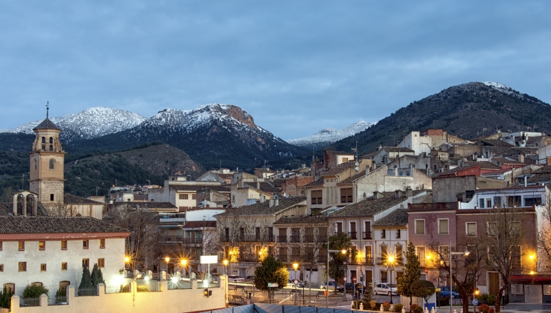 Caravaca de la Cruz, Spain, with snow-capped mountains