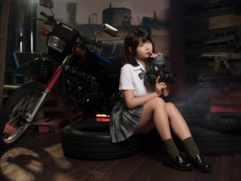 Asian girl with gas mask and Yamaha motorcycle