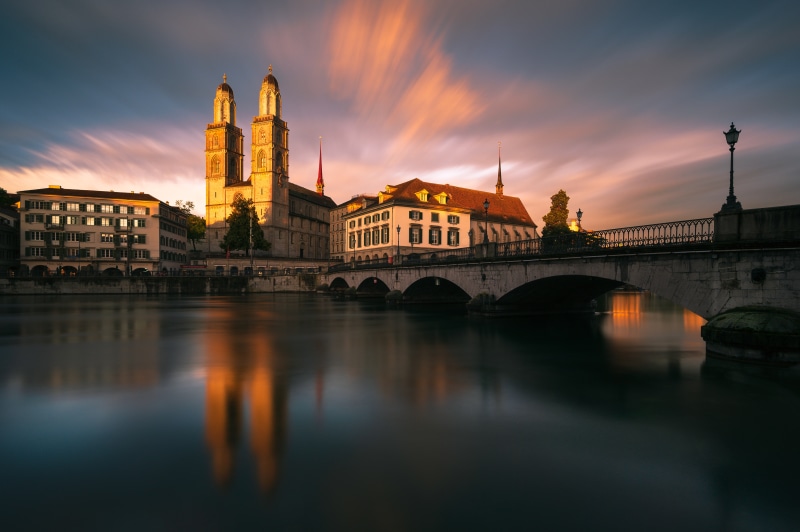 Grossmünster church and bridge over Limmat River in Zurich, Switzerland