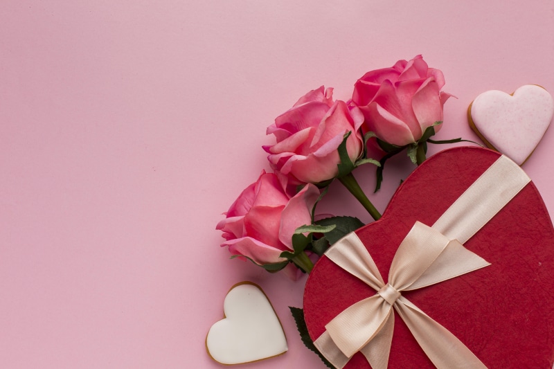 Pink Roses and Heart-Shaped Gift Box with Cookies