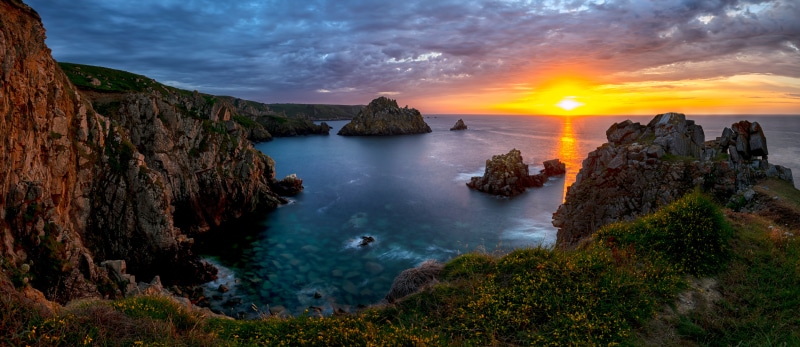 Sunset over the rocky coast of Lannuign, France