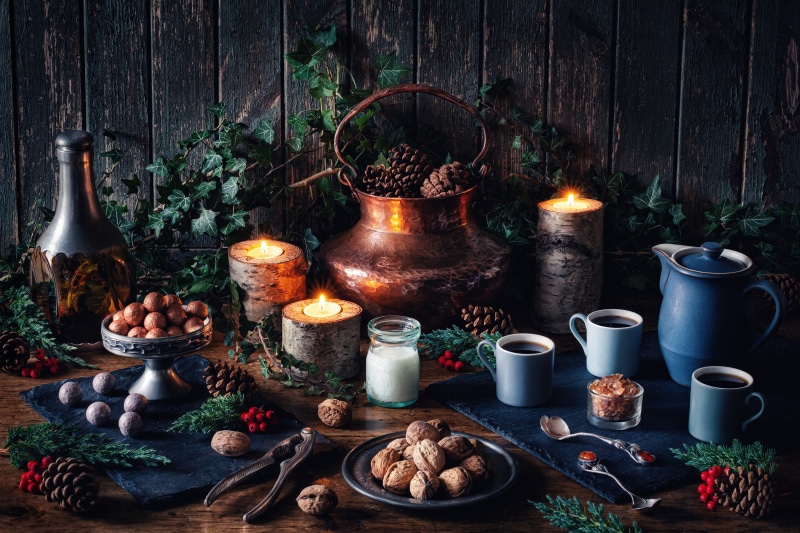 Still-life with coffee, nuts, and candles
