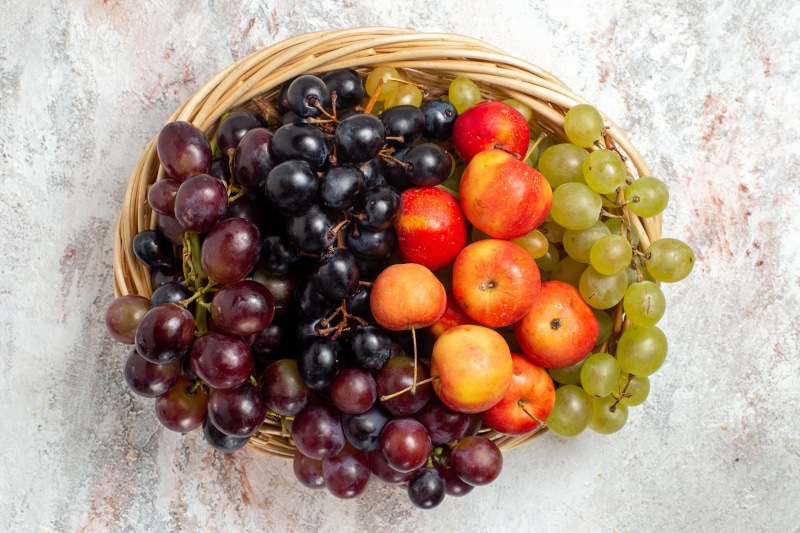 Basket of grapes and apples
