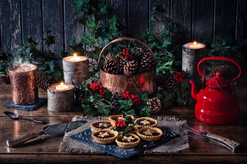 Christmas still life with mince pies and kettle
