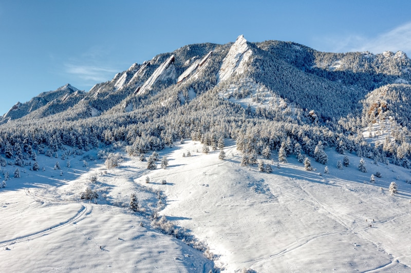 Snowy Flatirons Mountains in Chautauqua Park, USA