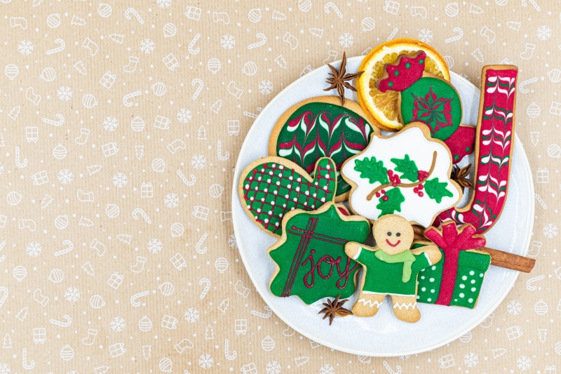 Christmas cookies on a plate with festive decorations